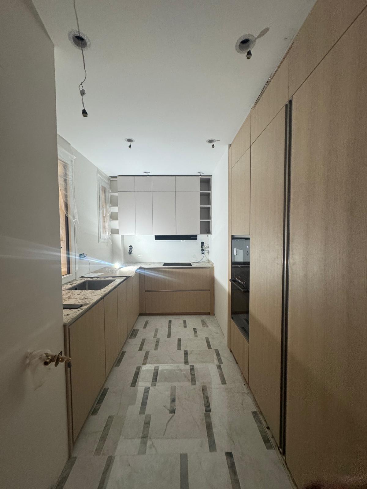 Natural wood bespoke kitchen detail